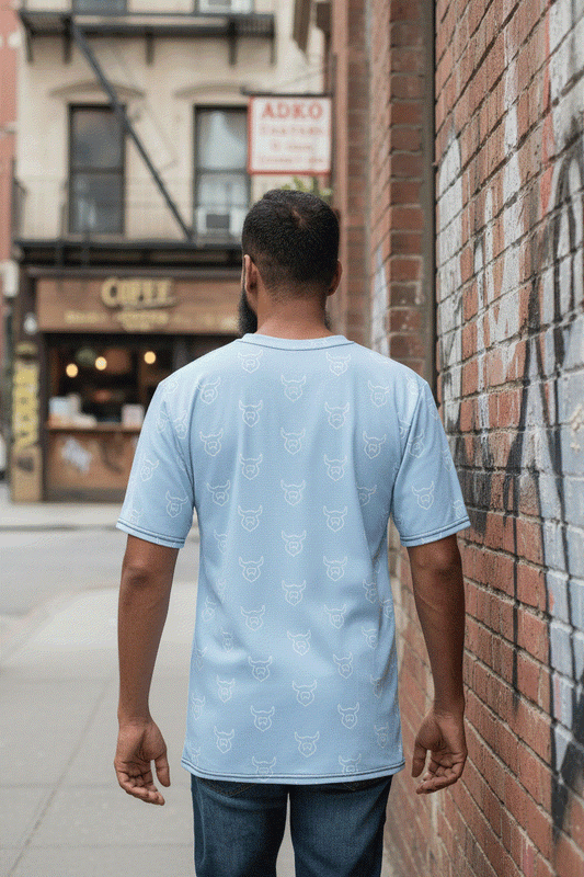 Man walking away down alley showing back of all-over Viking t-shirt