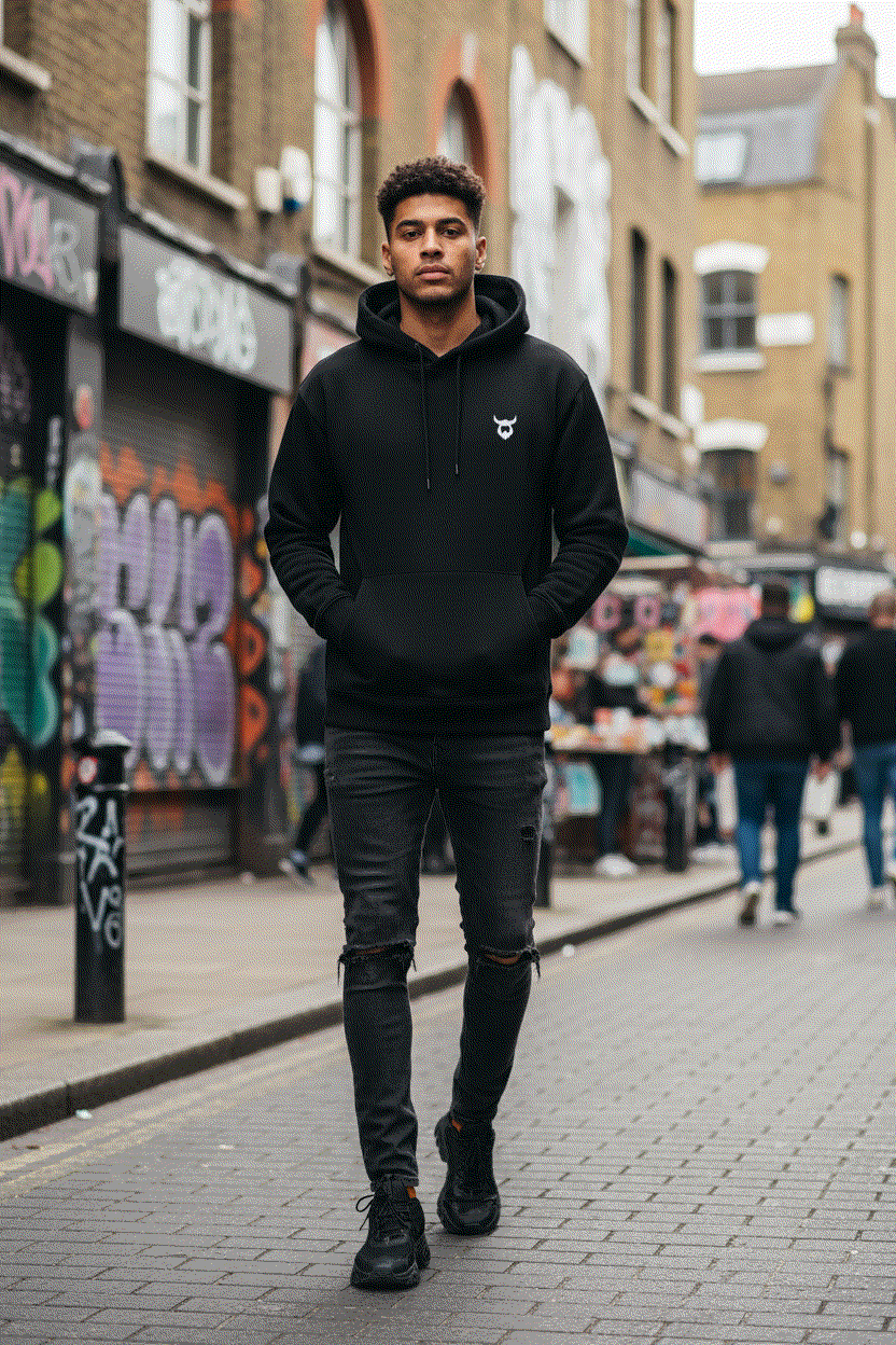 Trendy guy in Viking hoodie on Brick Lane